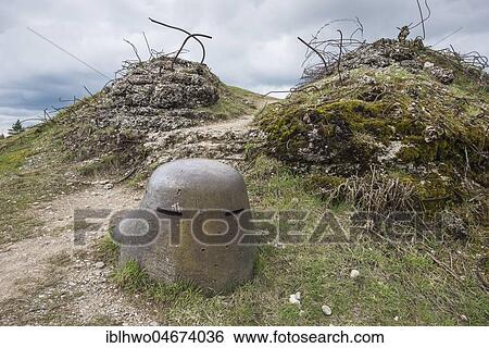 Stock Photograph - Observation tower with observation slits, bullet holes in a steel shell, destroyed area, Fort de Vaux, Memorial and Museum, Battlefield of Verdun, First World War, Verdun, Grand Est, France, Europe. Fotosearch