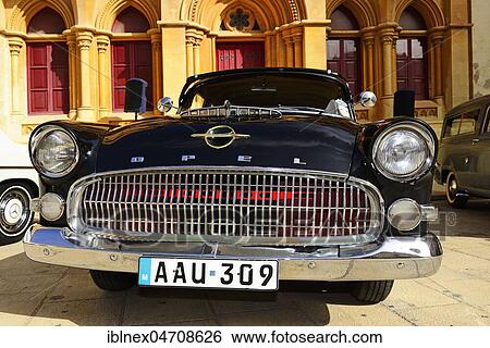 Stock Photograph - Old black Opel car, Grand Prix of classic cars, Mdina, Malta, Europe. Fotosearch