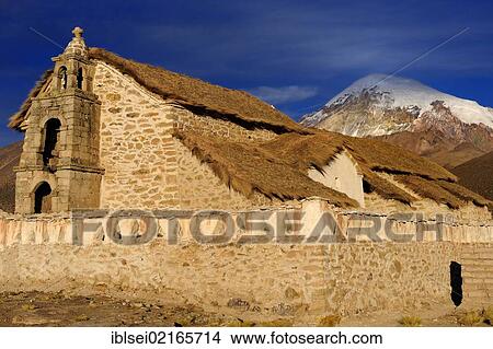 Picture - Old chapel in front of Sajama Mountain, Sajama National Park, La Paz, Bolivia, South America. Fotosearch