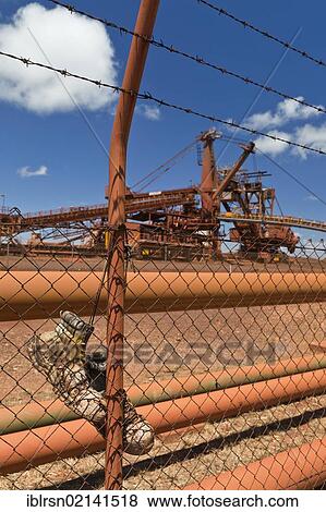Stock Photo - Old industrial site of BHP Iron Ore, now called BHP Billion, a British-Australian mining group, Port Hedland, Western Australia, Australia, Oceania. Fotosearch