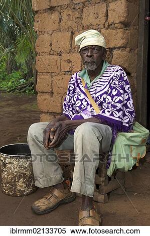 Old man outside his house, Bamenda, Cameroon, Africa View Large Photo Image Stock Photography - Old man outside his house, Bamenda, Cameroon, Africa. Fotosearch