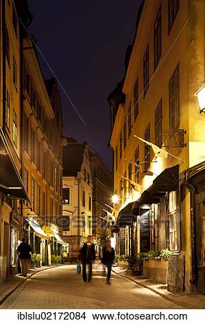 Picture - Old town alleyway at night, Gamla Stan, Stockholm, Sweden, Scandinavia, Europe. Fotosearch