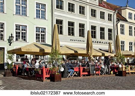 Stock Photo - Outdoor cafés in town hall square, old town, UNESCO World Heritage Site, Tallinn, Estonia, Baltic States, Northern Europe, Europe. Fotosearch