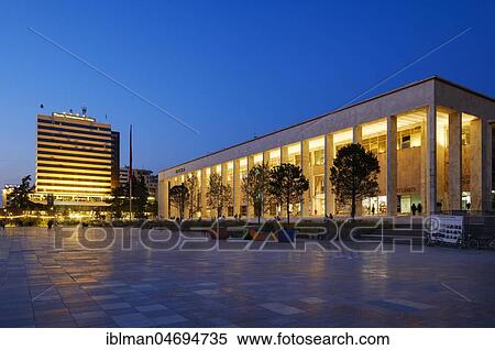 Stock Photography - Palace of Culture with Opera House and National Library, Skanderbeg Square, at dusk, Tirana, Albania, Europe. Fotosearch