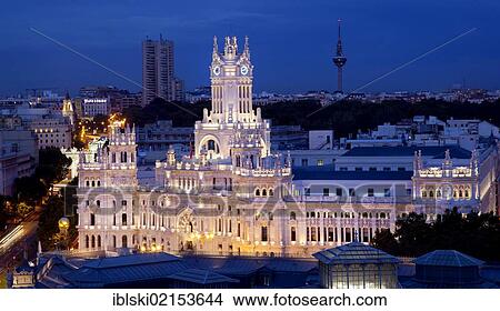 Picture - Palacio de Comunicaciones, at night, former headquarters of the postal service, now the Town Hall and City Council, Plaza de la Cibeles square, Madrid, Spain, Europe. Fotosearch