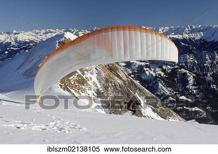 Paraglider starting, Pizol, St. Gallen, Switzerland, Europe View Large Photo Image Stock Photography - Paraglider starting, Pizol, St. Gallen, Switzerland, Europe. Fotosearch