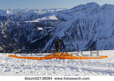 Paragliding, Pizol ski area, Bad Ragaz, Sarganserland region, St. Gallen, Switzerland, Europe View Large Photo Image Picture - Paragliding, Pizol ski area, Bad Ragaz, Sarganserland region, St. Gallen, Switzerland, Europe. Fotosearch