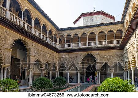 Stock Photograph - Patio de las Doncellas, Court of the Virgins, an Italian Renaissance courtyard, 1540 to 1572, with stucco arabesques in the Mudejares style, Alcazar, Royal Palace of Seville, Seville, Spain, Europe. Fotosearch