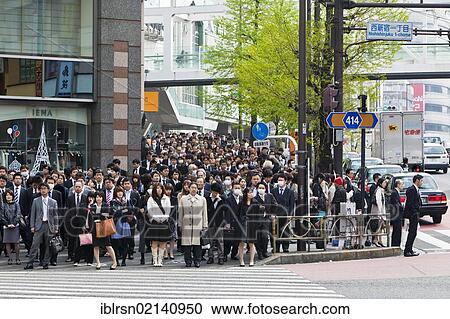 Pedestrians during the morning rush hour in the business district of Shinjuku, Tokyo, Japan, Asia View Large Photo Image Stock Image - Pedestrians during the morning rush hour in the business district of Shinjuku, Tokyo, Japan, Asia. Fotosearch