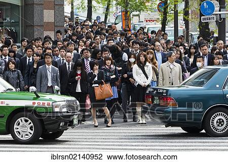 Pedestrians during the morning rush hour in the business district of Shinjuku, Tokyo, Japan, Asia View Large Photo Image Stock Image - Pedestrians during the morning rush hour in the business district of Shinjuku, Tokyo, Japan, Asia. Fotosearch