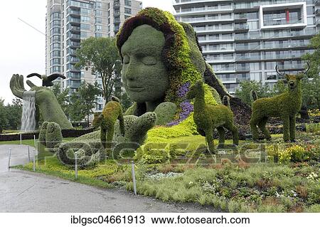 Plant sculpture Mother Earth with modern buildings behind, Mosaicanada Exhibition, Gatineau, Quebec Province, Canada, North America View Large Photo Image Stock Image - Plant sculpture Mother Earth with modern buildings behind, Mosaicanada Exhibition, Gatineau, Quebec Province, Canada, North America. Fotosearch