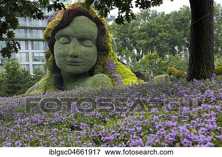 Plant sculpture Mother Earth with modern buildings behind, Mosaicanada Exhibition, Gatineau, Quebec Province, Canada, North America View Large Photo Image Stock Photo - Plant sculpture Mother Earth with modern buildings behind, Mosaicanada Exhibition, Gatineau, Quebec Province, Canada, North America. Fotosearch