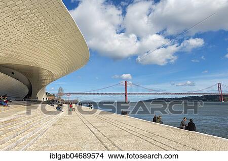Picture - Ponte 25 de Abril bridge over the Tagus river, viewed from the MAAT, Museum of Art, Architecture and Technology, Lisbon, Portugal, Europe. Fotosearch