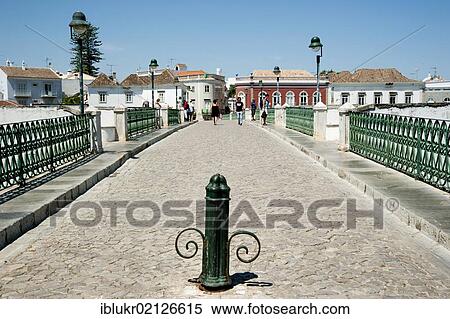 Ponte Romana in the town of Tavira, eastern Algarve, Portugal, Europe View Large Photo Image Stock Photography - Ponte Romana in the town of Tavira, eastern Algarve, Portugal, Europe. Fotosearch