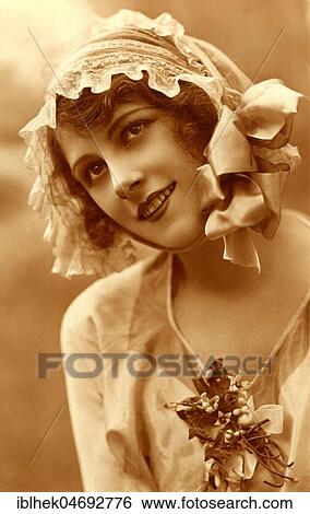 Stock Photograph - Portrait, fashion, hat fashion, woman with hood on head, 1920s, Germany, Europe. Fotosearch