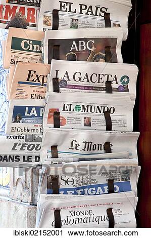 Stock Image - Portuguese and international newspapers at a newsstand in Lisbon, Portugal, Europe. Fotosearch