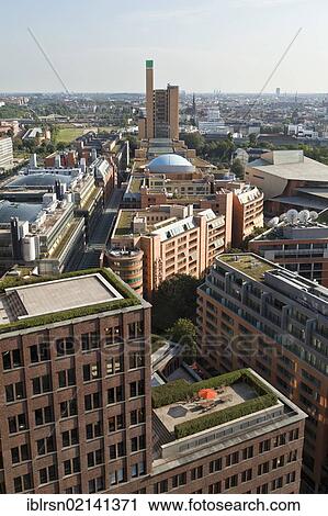 Stock Image - Potsdamer Platz square from above, seen from DB Tower, with Kollhoff Tower at the front and debis-Haus at the rear, Berlin, Germany, Europe. Fotosearch