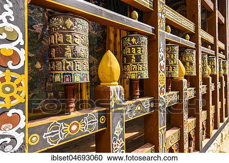 Prayer mills and mural painting in the monastery fortress, Trongsa Dzong, Trongsa, Himalayan region, Bhutan, Asia View Large Photo Image Stock Image - Prayer mills and mural painting in the monastery fortress, Trongsa Dzong, Trongsa, Himalayan region, Bhutan, Asia. Fotosearch