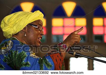 Stock Image - Preacher at church service, Christian Women's Fellowship, CWF, Limbe, Cameroon, Africa. Fotosearch