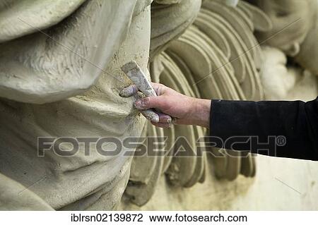Production of sculptures and decorative figures made of clay for the reconstruction of the Berlin City Palace in the Baroque workshop of Wedding, working on sculptures from the sculptural niche of the Suedkehle of portal 3, Berlin, Germany, Europe View Large Photo Image Stock Image - Production of sculptures and decorative figures made of clay for the reconstruction of the Berlin City Palace in the Baroque workshop of Wedding, working on sculptures from the sculptural niche of the Suedkehle of portal 3, Berlin, Germany, Europe. Fotosearch