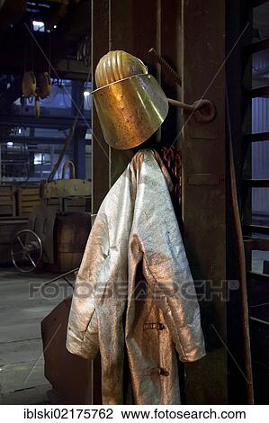 Protective equipment, helmet and jacket of a smelter worker of the Luitpoldhuette AG, a foundry that specializes in the casting of engine blocks, motor parts and refrigeration compressors, in Amberg, Bavaria, Germany, Europe View Large Photo Image Stock Image - Protective equipment, helmet and jacket of a smelter worker of the Luitpoldhuette AG, a foundry that specializes in the casting of engine blocks, motor parts and refrigeration compressors, in Amberg, Bavaria, Germany, Europe. Fotosearch