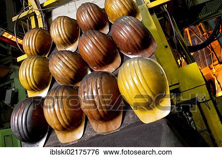Protective helmets of the employees of the Luitpoldhuette AG, a foundry that specializes in the casting of engine blocks, motor parts and refrigeration compressors, in Amberg, Bavaria, Germany, Europe View Large Photo Image Stock Photograph - Protective helmets of the employees of the Luitpoldhuette AG, a foundry that specializes in the casting of engine blocks, motor parts and refrigeration compressors, in Amberg, Bavaria, Germany, Europe. Fotosearch