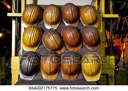 Protective helmets of the employees of the Luitpoldhuette AG, a foundry that specializes in the casting of engine blocks, motor parts and refrigeration compressors, in Amberg, Bavaria, Germany, Europe View Large Photo Image Stock Photography - Protective helmets of the employees of the Luitpoldhuette AG, a foundry that specializes in the casting of engine blocks, motor parts and refrigeration compressors, in Amberg, Bavaria, Germany, Europe. Fotosearch