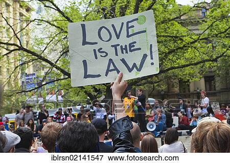 Stock Photo - Protest sign "Love is the law", Occupy Melbourne, demonstration in the city centre with about 200 participants, Melbourne, Victoria, Australia, Oceania. Fotosearch