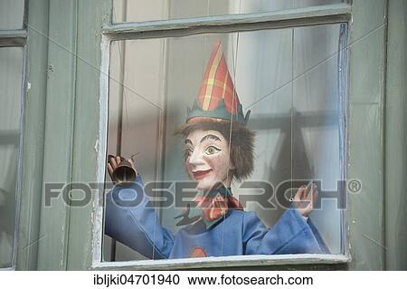 Stock Image - Punch in the window of the Theatre Figure Museum, Lübeck, Schleswig-Holstein, Germany, Europe. Fotosearch