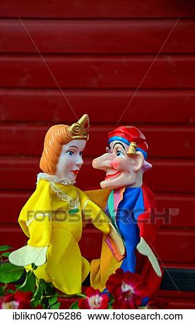 Punch puppets, Punch and Judy, princess, sitting on a metal fence View Large Photo Image Stock Photograph - Punch puppets, Punch and Judy, princess, sitting on a metal fence. Fotosearch