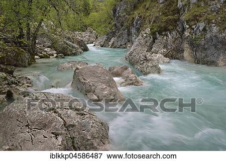 Stock Photo - Rapids and rocks in the wild river Soča, Soča Valley, Julian Alps, Slovenia, Europe. Fotosearch