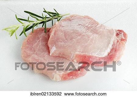 Raw pork loin steaks, rosemary leaves View Large Photo Image Stock Image - Raw pork loin steaks, rosemary leaves. Fotosearch
