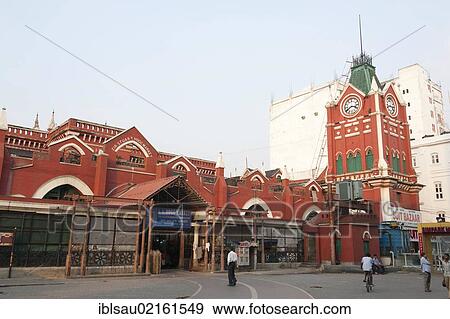 Red building with a clock tower, old British colonial architecture, covered market, New Market, Hogg Market, Lindsay Street, Chowringhee, Calcutta, Kolkata, West Bengal, India, South Asia, Asia View Large Photo Image Stock Photo - Red building with a clock tower, old British colonial architecture, covered market, New Market, Hogg Market, Lindsay Street, Chowringhee, Calcutta, Kolkata, West Bengal, India, South Asia, Asia. Fotosearch
