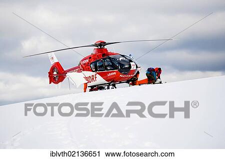 Rescue operation with a rescue helicopter in the Thuringian Slate Mountains, Thuringia, Germany, Europe View Large Photo Image Stock Image - Rescue operation with a rescue helicopter in the Thuringian Slate Mountains, Thuringia, Germany, Europe. Fotosearch