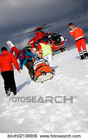 Rescue operation with a rescue helicopter in the Thuringian Slate Mountains, Thuringia, Germany, Europe View Large Photo Image Stock Photograph - Rescue operation with a rescue helicopter in the Thuringian Slate Mountains, Thuringia, Germany, Europe. Fotosearch