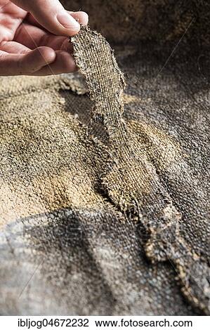 Restoration atelier, hand holds sample inlay to cover crack in lent scarf, Munich, Bavaria, Germany, Europe View Large Photo Image Stock Image - Restoration atelier, hand holds sample inlay to cover crack in lent scarf, Munich, Bavaria, Germany, Europe. Fotosearch
