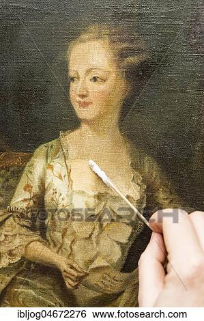 Restoration studio, restorer, hand cleans a painting with cotton swabs, Munich, Bavaria, Germany, Europe View Large Photo Image Stock Photograph - Restoration studio, restorer, hand cleans a painting with cotton swabs, Munich, Bavaria, Germany, Europe. Fotosearch
