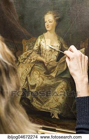 Restoration studio, restorer, woman cleans a painting with cotton swabs, Munich, Bavaria, Germany, Europe View Large Photo Image Picture - Restoration studio, restorer, woman cleans a painting with cotton swabs, Munich, Bavaria, Germany, Europe. Fotosearch