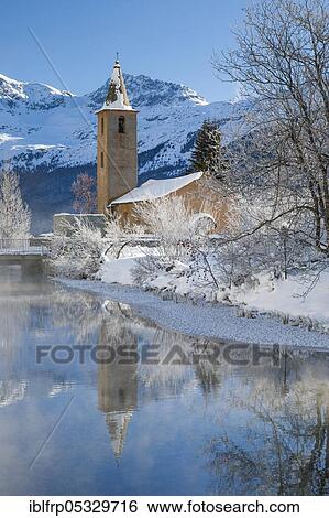 Stock Photograph - River Inn, St. Lawrence Church, Sils, Graubuenden, Switzerland, Europe. Fotosearch
