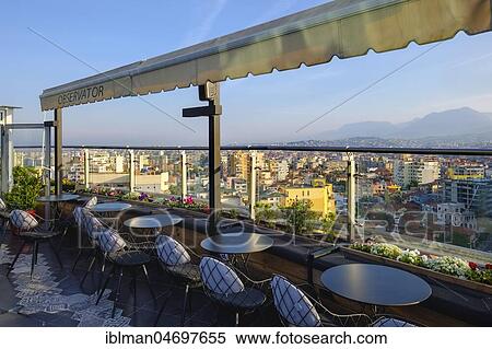 Roof terrace of the Piano Bar Observator, view of the city centre, Tirana, Albania, Europe View Large Photo Image Stock Photography - Roof terrace of the Piano Bar Observator, view of the city centre, Tirana, Albania, Europe. Fotosearch
