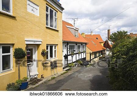 Stock Photograph - Row of Timber-framed houses in Gudhjem village, Bornholm, Denmark, Europe. Fotosearch