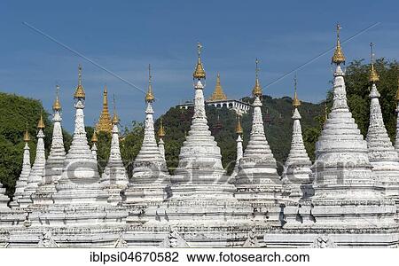 Row of white stupas at Sandamuni Pagoda, Mandalay, Myanmar, Asia View Large Photo Image Stock Image - Row of white stupas at Sandamuni Pagoda, Mandalay, Myanmar, Asia. Fotosearch