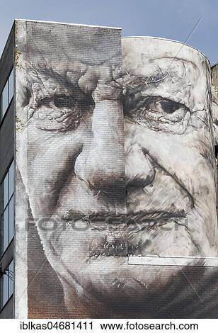 Rugged face of a man, Mural by Australian street artist Guido van Helten, The Crystal Ship Festival 2016, Ostend, West-Flanders, Belgium, Europe View Large Photo Image Stock Image - Rugged face of a man, Mural by Australian street artist Guido van Helten, The Crystal Ship Festival 2016, Ostend, West-Flanders, Belgium, Europe. Fotosearch