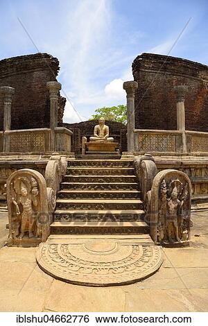 Stock Photograph - Ruin of a temple with moonstone and Buddha statue, Polonnaruwa, North Central Province Sri Lanka. Fotosearch