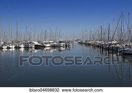 Sailboats in a marina, Heiligenhafen, Schleswig-Holstein, Germany, Europe View Large Photo Image Stock Image - Sailboats in a marina, Heiligenhafen, Schleswig-Holstein, Germany, Europe. Fotosearch