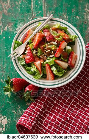 Salad with strawberries served in a plate View Large Photo Image Stock Photo - Salad with strawberries served in a plate. Fotosearch