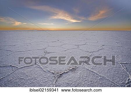 Stock Image - Salt lake at sunrise, Salar de Uyuni, Uyuni, Bolivia, South America. Fotosearch
