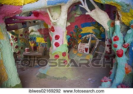 Stock Image - Salvation Mountain, a desert hillside covered with religious messages, created by Leonard Knight, Niland, California, USA, North America. Fotosearch
