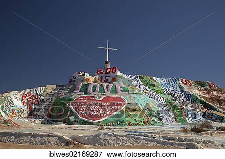 Salvation Mountain, a desert hillside covered with religious messages, created by Leonard Knight, Niland, California, USA, North America View Large Photo Image Stock Photo - Salvation Mountain, a desert hillside covered with religious messages, created by Leonard Knight, Niland, California, USA, North America. Fotosearch