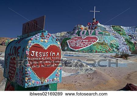 Stock Photo - Salvation Mountain, a desert hillside covered with religious messages, created by Leonard Knight, Niland, California, USA, North America. Fotosearch